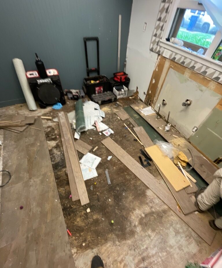 Kitchen flooring removed during water damage repair in Kansas City